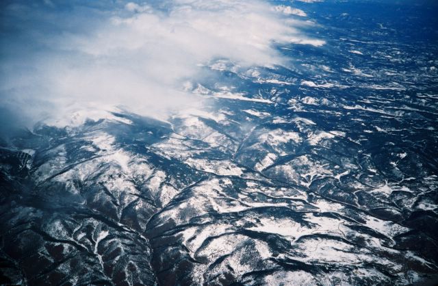 When we flew over Denver, there was this amazing transformation from flat squares of land to huge mountains.